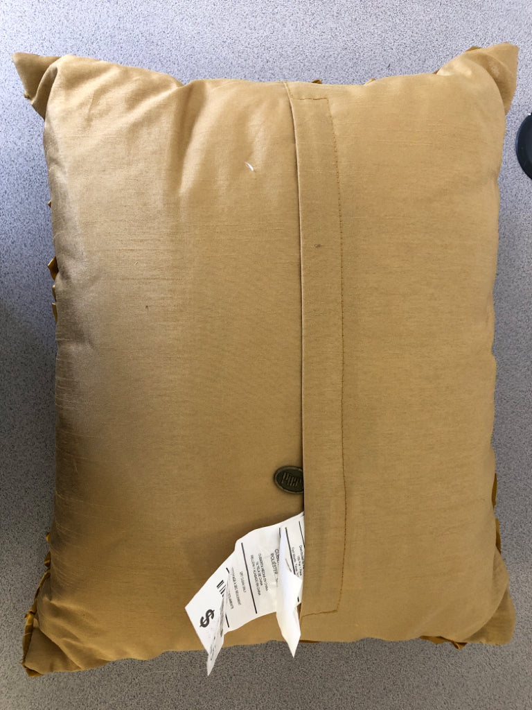 GOLD RUFFLE PILLOW.