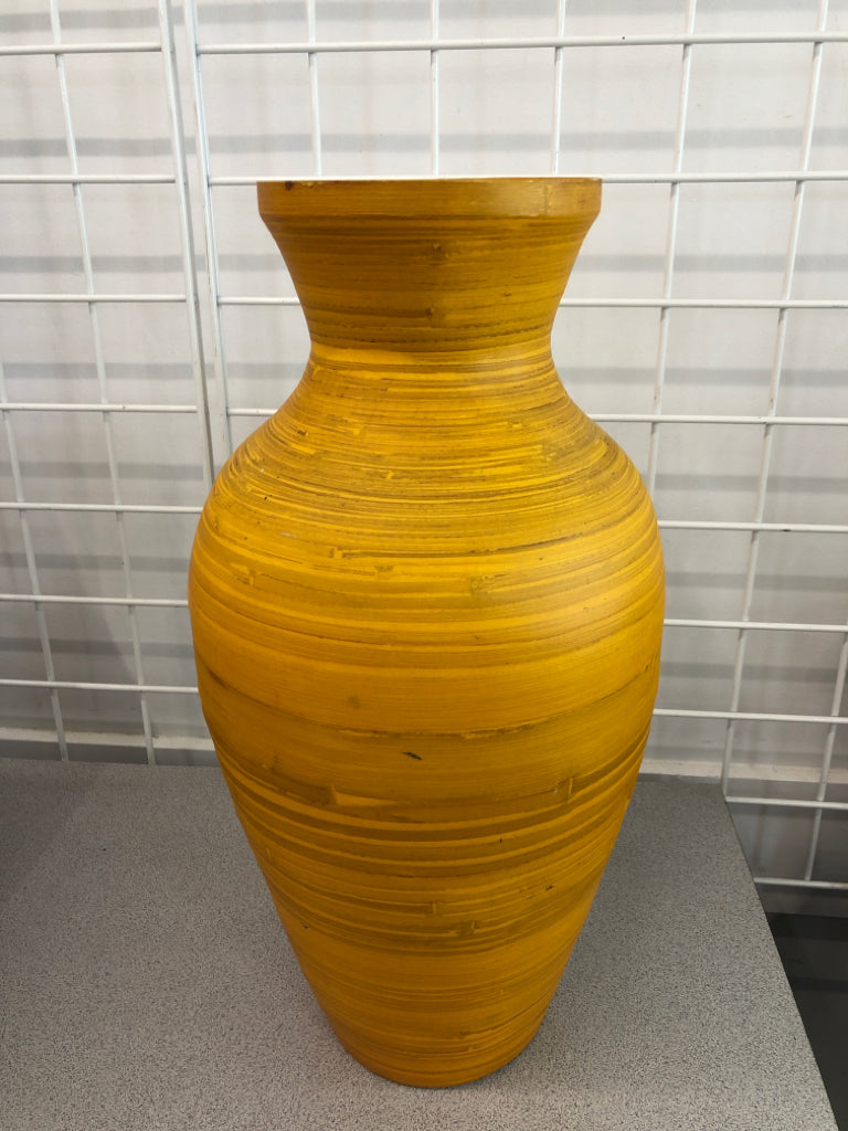 ORANGE PAINTED LIGHT WOODEN VASE.