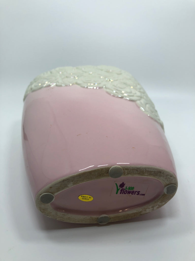 PINK VASE W/WHITE IRIDESCENT EMBOSSED FLOWERS.