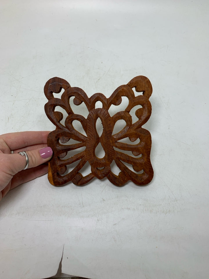 WOOD CARVED BUTTERFLY TRIVET.