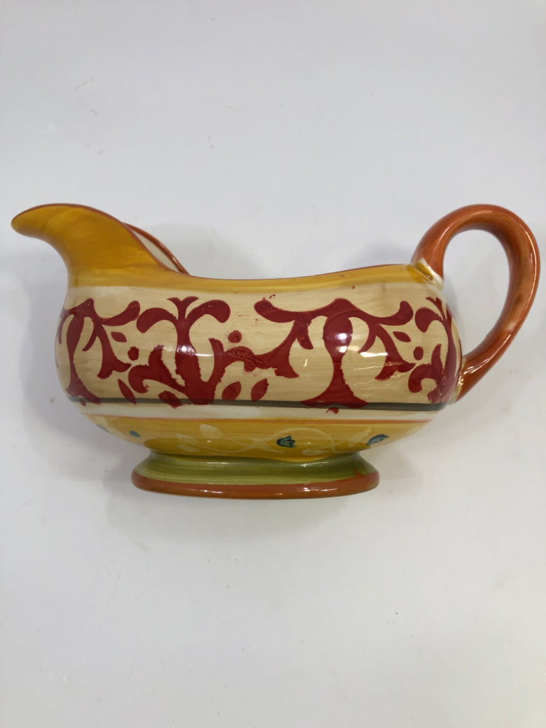 ORANGE SCROLL DESIGN GRAVY BOAT STONEWARE.