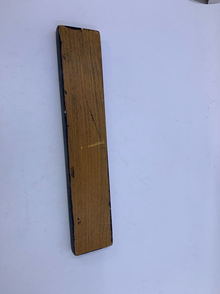 BLACK WOOD THIS HOME IS SIGN.