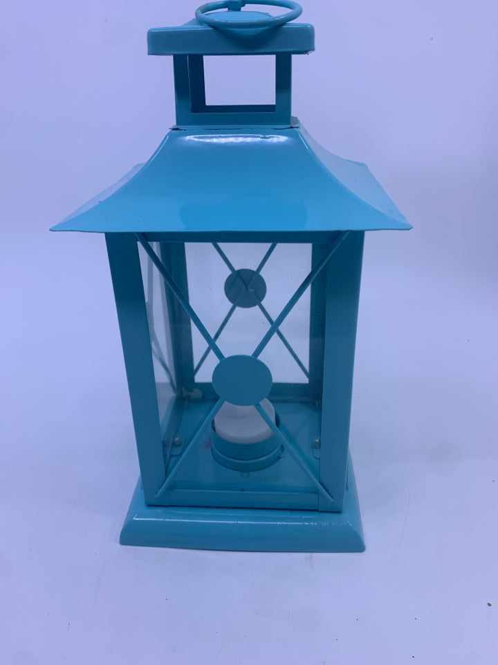 LIGHT BLUE METAL TEA LIGHT LANTERN.