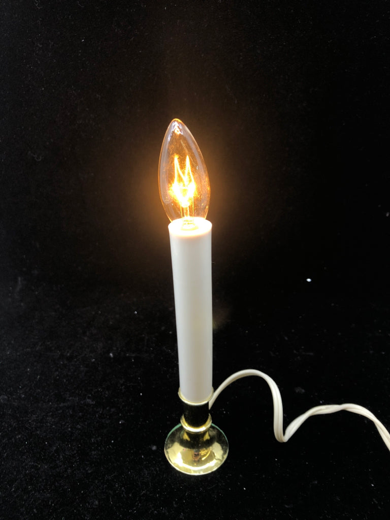 WHITE PLUG IN CANDLE LIGHT.