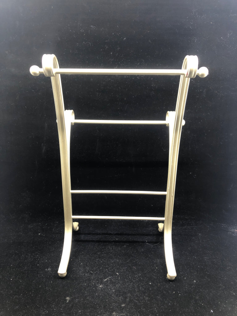 SILVER TOWEL RACK.