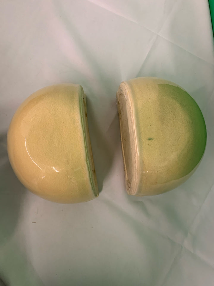 2 TAN CERAMIC WALL HANGING PLANTERS.