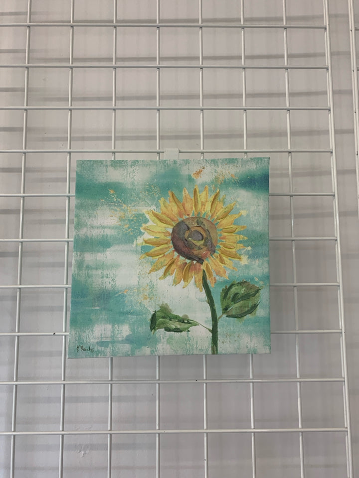 SINGLE SUNFLOWER IN TEAL BACKGROUND CANVAS WALL ART.