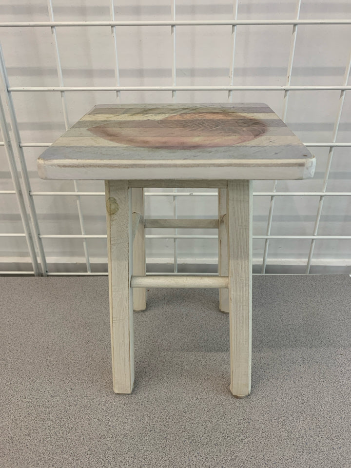 SMALL WHITE WOODEN STOOL W/SHELL DESIGN.