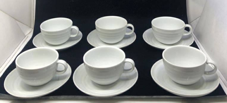 12 PIECE WHITE CUP AND SAUCERS - 6 CUPS AND 6 PLATES.