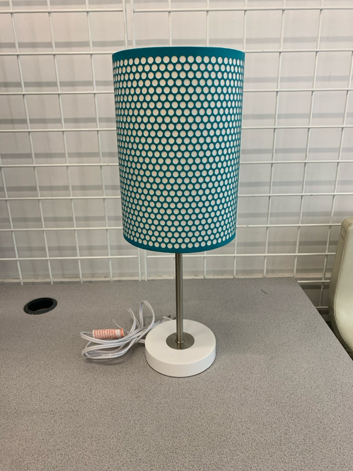 LAMP W/ BLUE WHITE DOTTED SHADE.