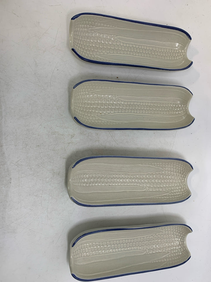 4 CERAMIC CORN ON THE COBB HOLDERS.