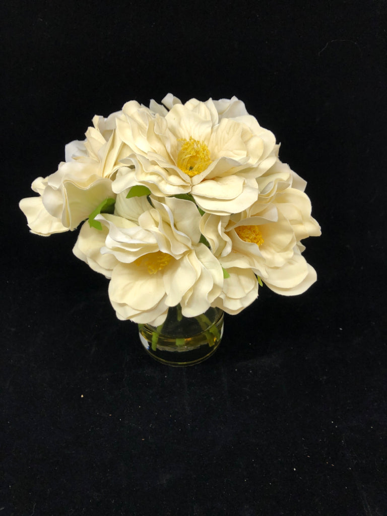 FAUX WHITE FLOWERS IN GLASS VASE.