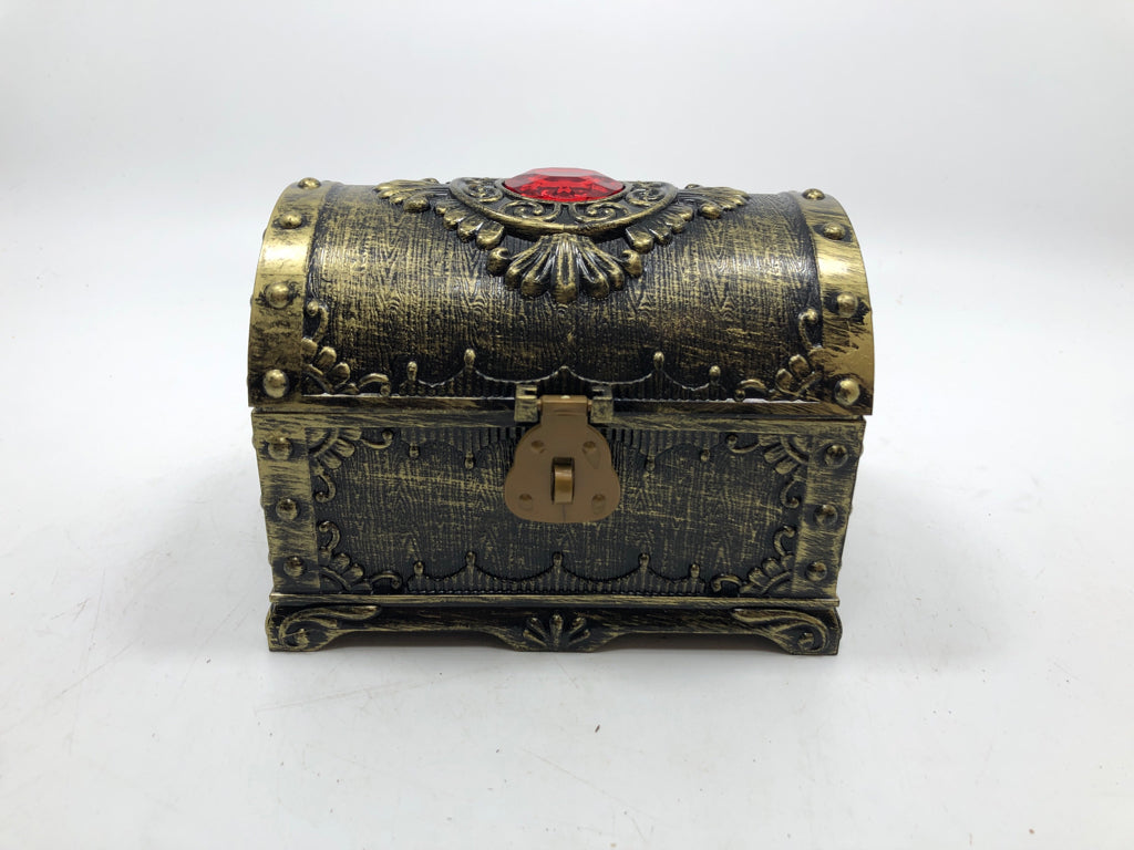BRONZE DISTRESSED PLASTIC TREASURE CHEST W/LOCK AND KEY.