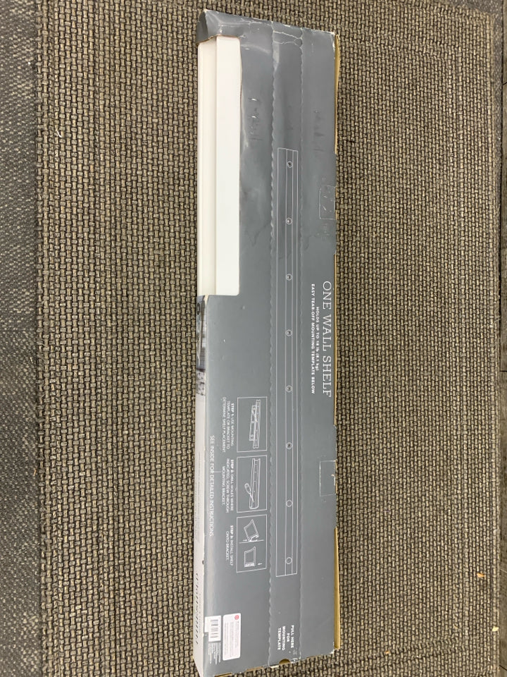 NIB WHITE FLOATING WALL SHELF.
