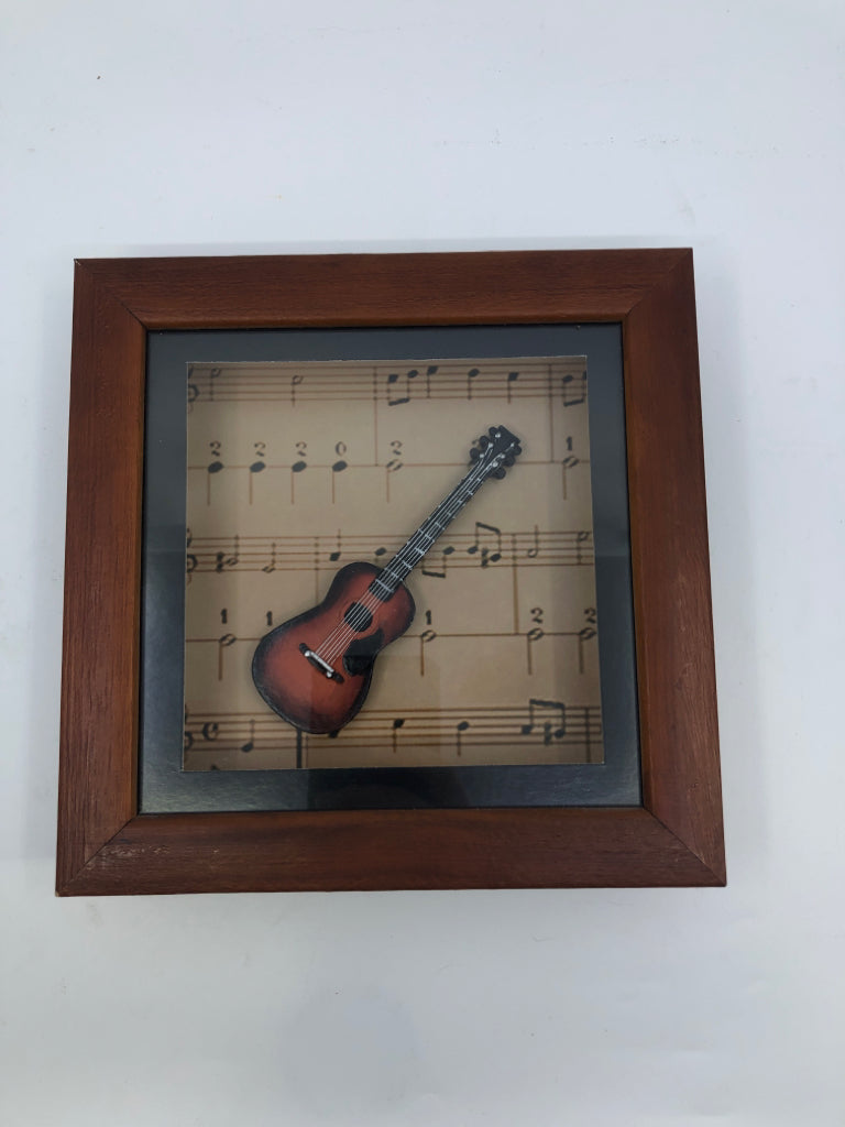 SHADOW BOX W/ GUITAR WALL HANGING.