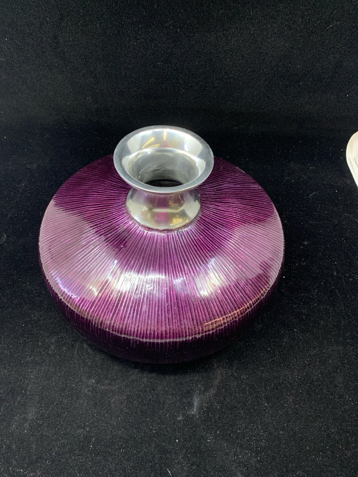 HEAVY METAL VASE W/ PURPLE GLAZE.