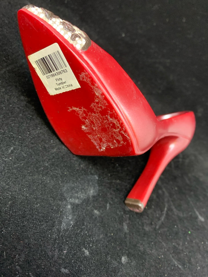 CERAMIC MAROON HEEL CANDLE HOLDER.