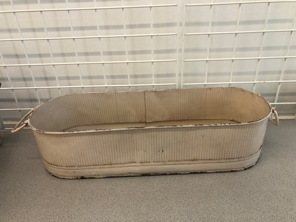 RUSTIC METAL OVAL PLANTER.