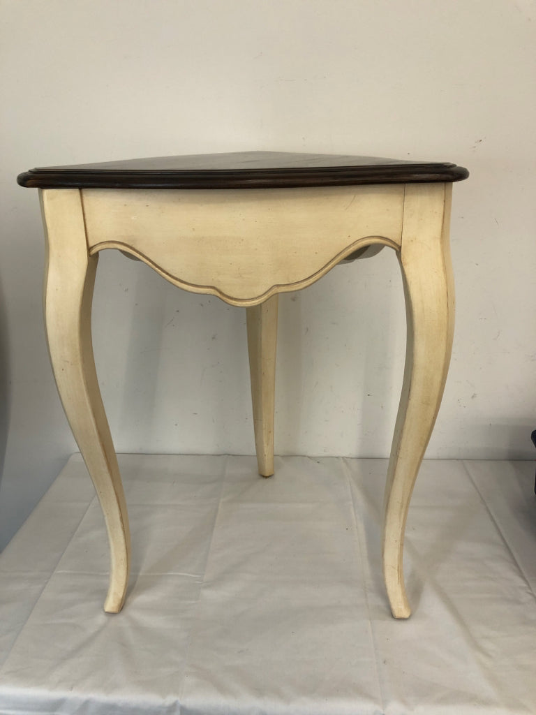 WOOD AND CREAM CORNER TABLE.