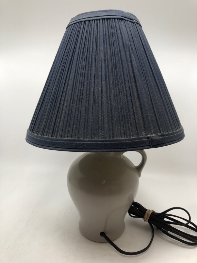 SNOWMAN STONEWARE JUG LAMP W/BLUE PLEATED SHADE.
