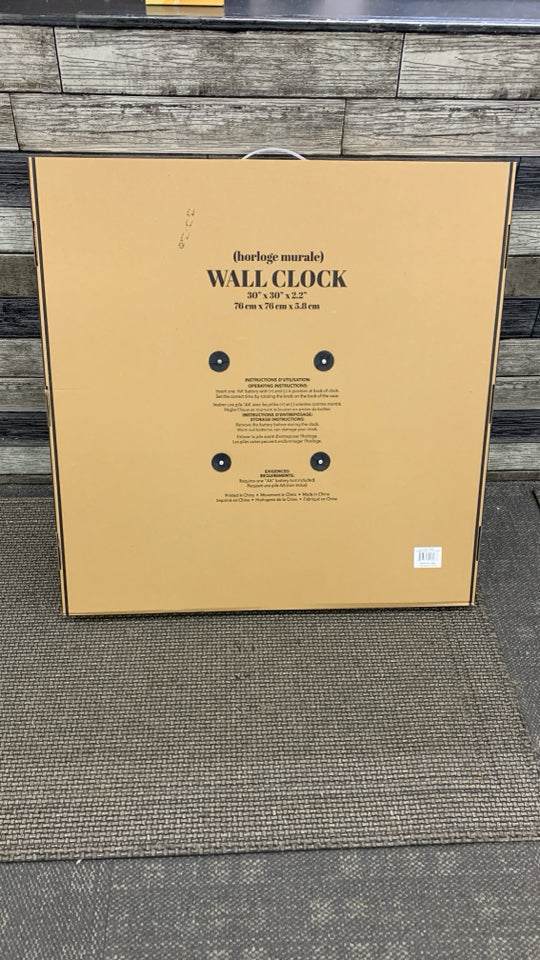 NIB WHITE WASHED PLASTIC WALL CLOCK.