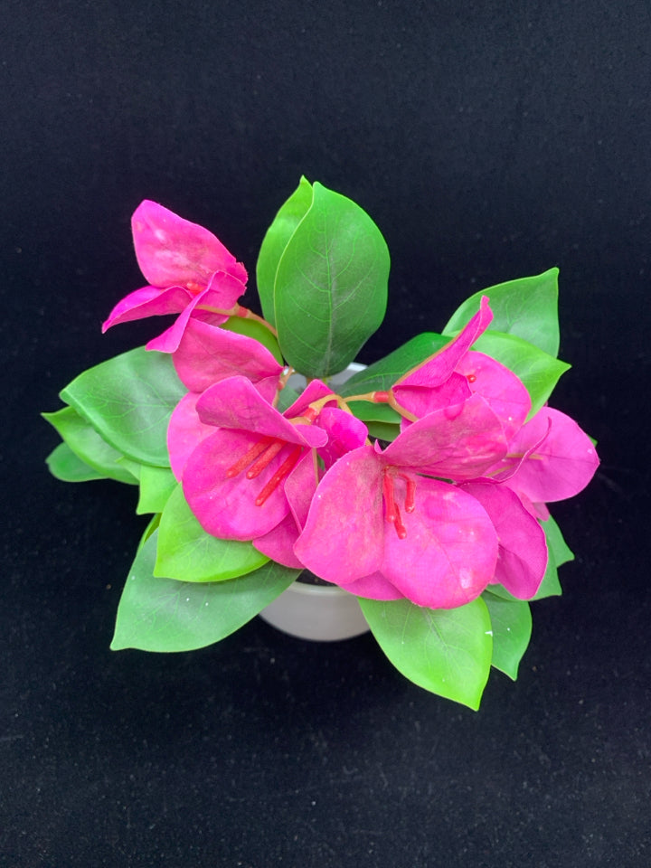 FAUX PINK FLORAL IN WHITE POT.
