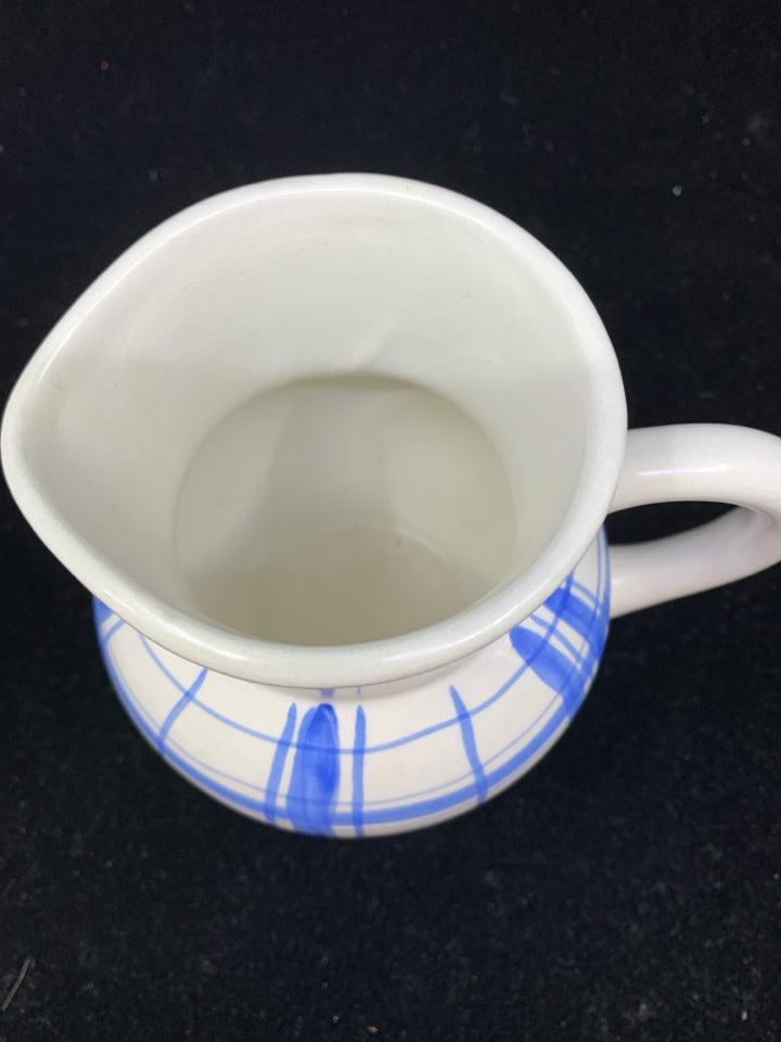 SMALL BLUE AND WHITE PITCHER.