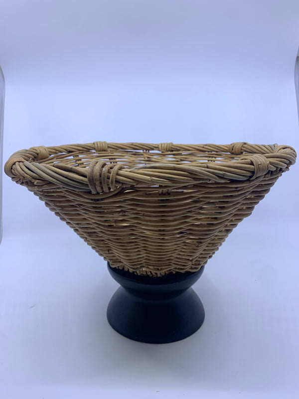 BLACK FOOTED WICKER WOVEN FRUIT BASKET.