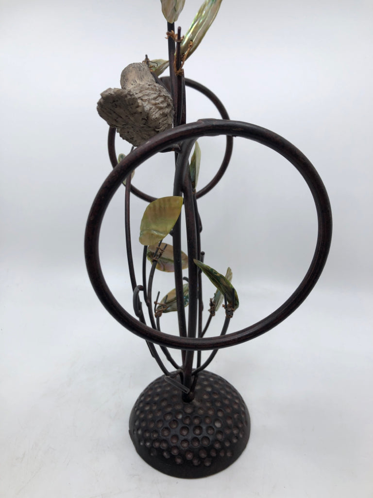 BROWN METAL W/LEAVES AND BIRDS TOWEL HOLDER.