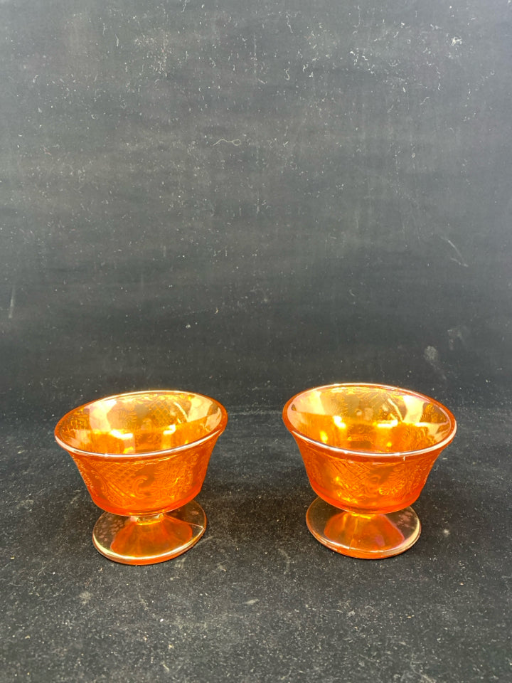 2 FOOTED VTG CARNIVAL GLASS DESSERT BOWLS.