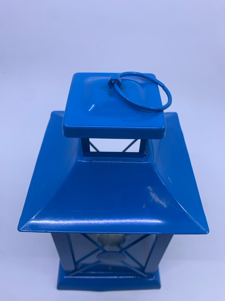 BLUE METAL TEA LIGHT LANTERN.