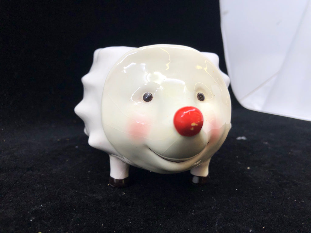 RED AND WHITE HEDGE HOG.