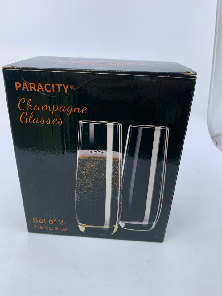 NIB 2 STEMLESS CHAMPAGNE GLASSES.