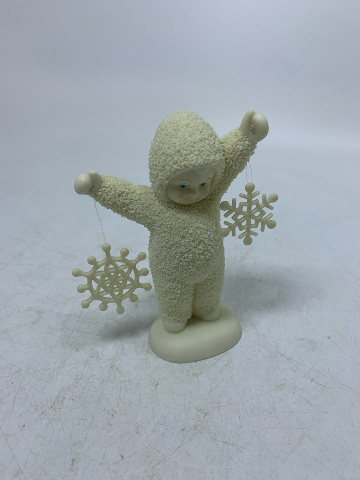BABY HOLDING SNOWFLAKES SNOWBABIES.