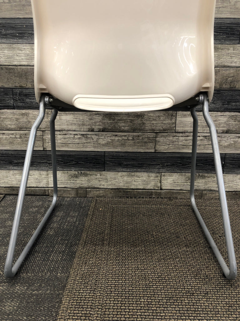 IKEA WHITE PLASTIC CHAIR W/METAL LEGS.