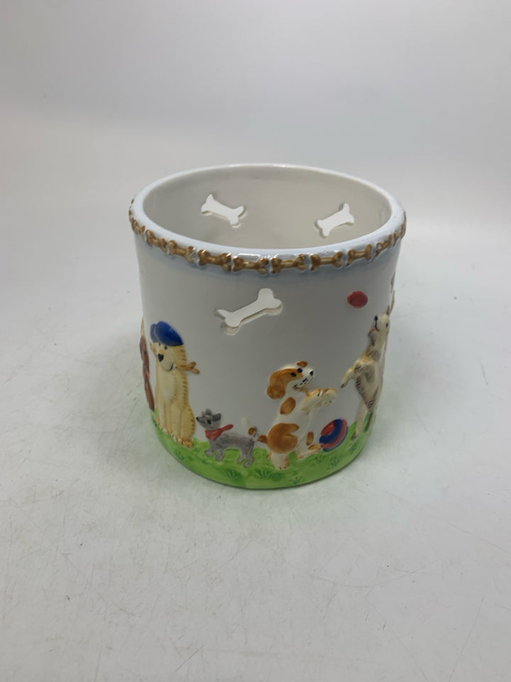 CERAMIC EMBOSSED ASSORTED DOGS PILLAR CANDLE HOLDER.