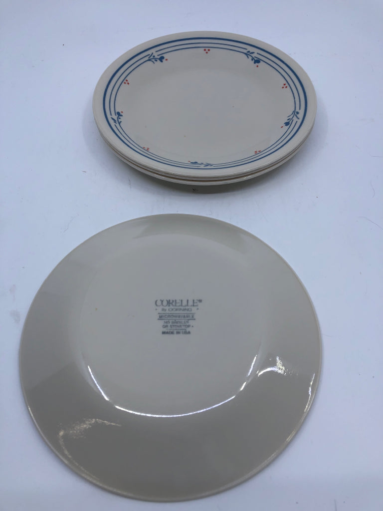 4 BLUE AND RED FLORAL TAN CORELLE SMALL PLATES.