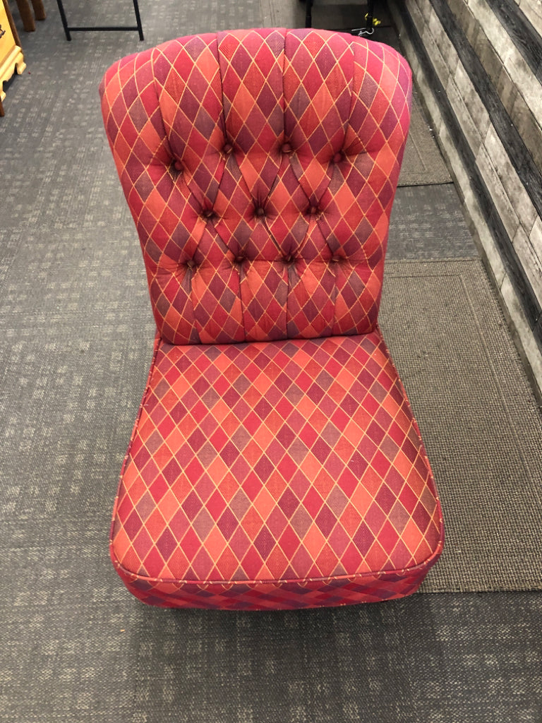 MULTI COLORED PRISM PATTERN FABRIC ACCENT CHAIR.