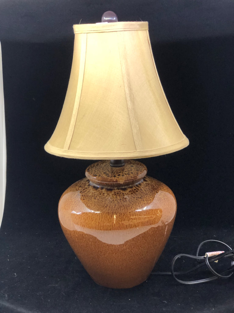 BROWN POTTERY BASE LAMP W TAN SHADE.