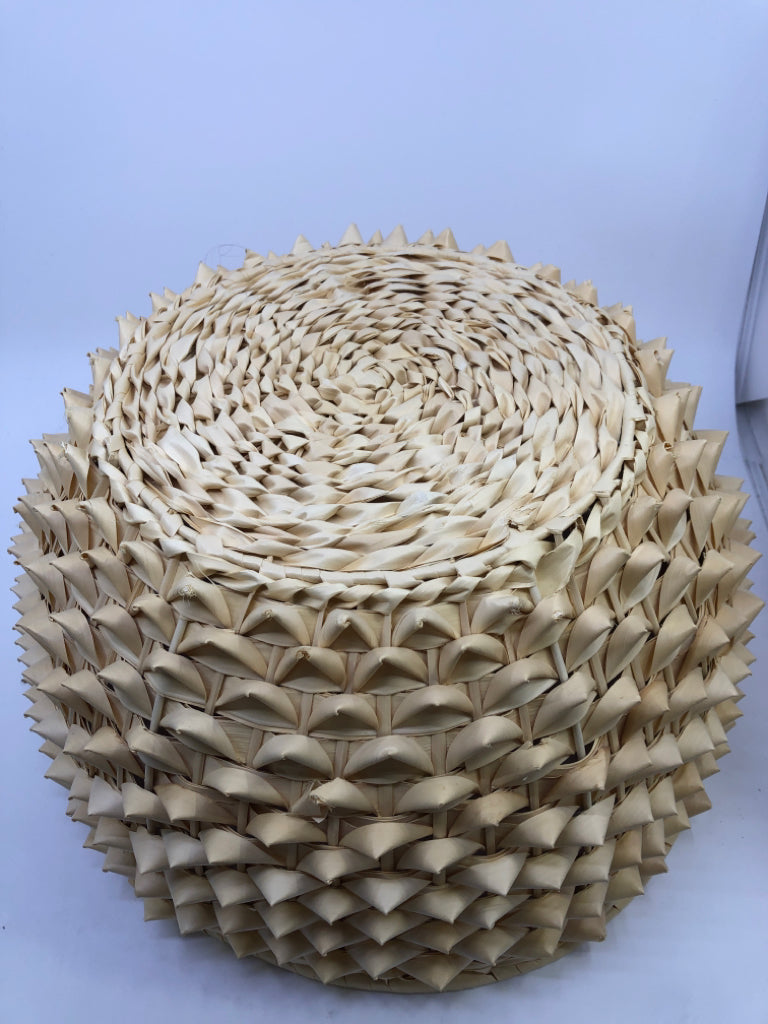 LIGHT WEIGHT WOVEN CIRCLE BASKET W/ SPIKED OUTSIDE.
