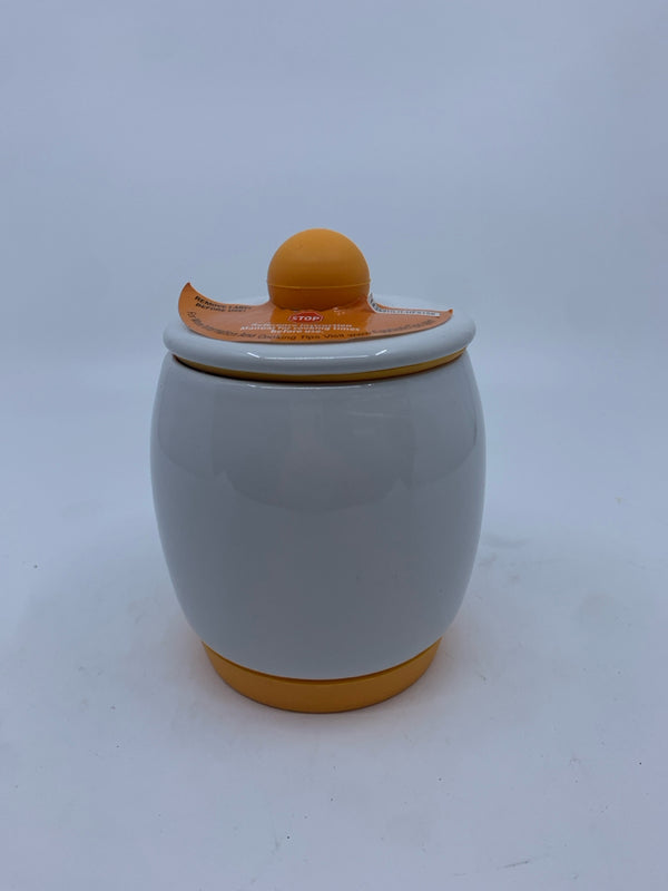 WHITE ORANGE EGG COOKER.