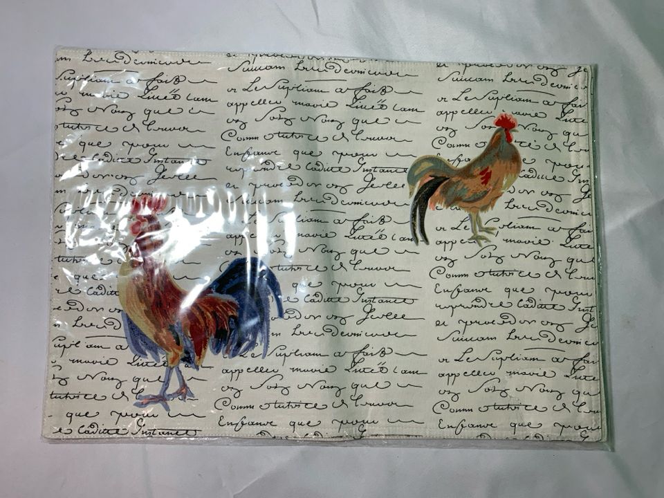 NIP PLACEMATS WHITE/BLACK WRITING COLORFUL HENS.