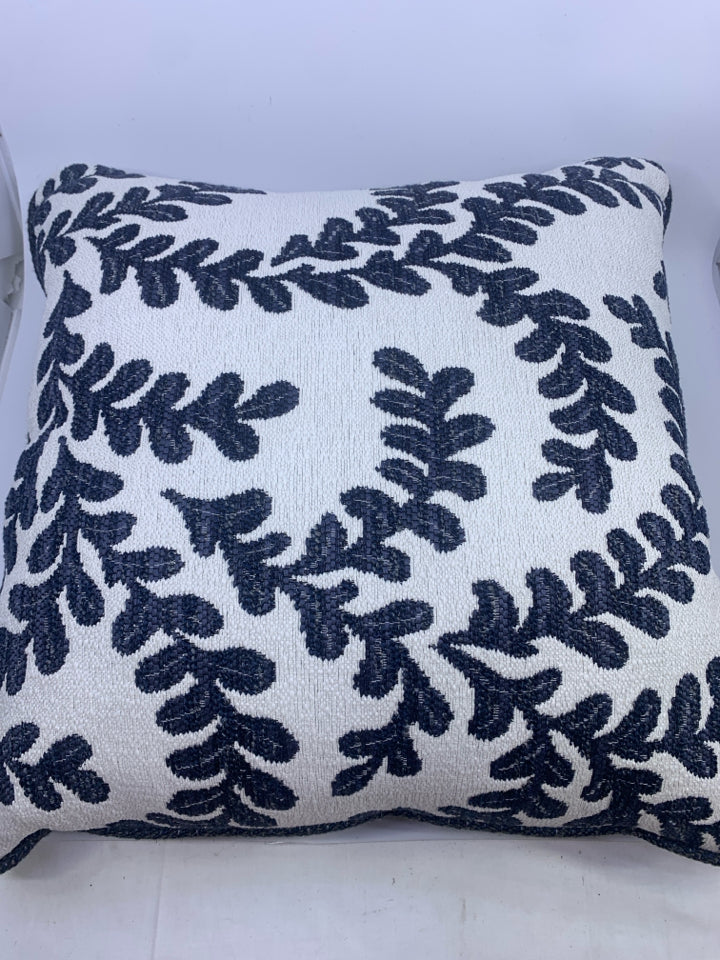 NAVY LEAF DETAIL, WHITE AND NAVY PILLOW.