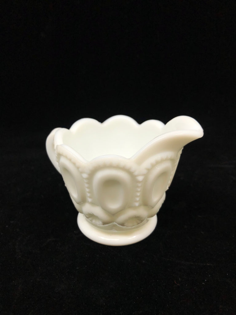VTG MILK GLASS CREAMER W/CIRCLE PATTERN.