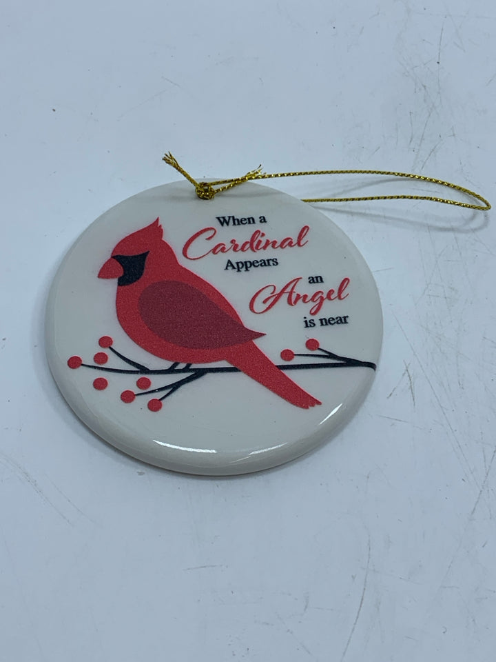 CERAMIC WHEN A CARDINAL CIRCLE ORNAMENT.