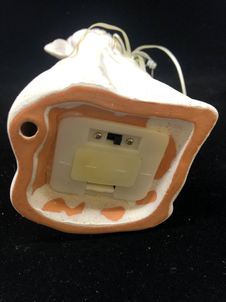 CREAM CERAMIC ANGEL/W LIGHT UP FLOWERS.