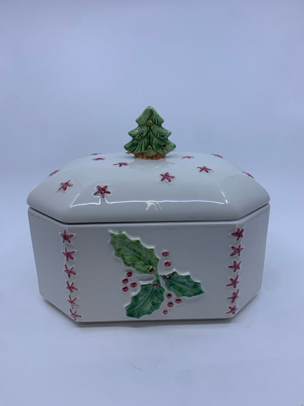 WHITE CERAMIC W HOLLY COOKIE JAR WITH TREE TOPPER LID.