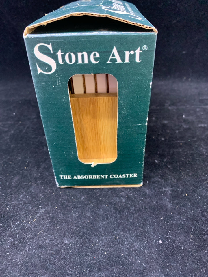 4 NIB WINE BOTTLES STONE COASTERS IN STAND.