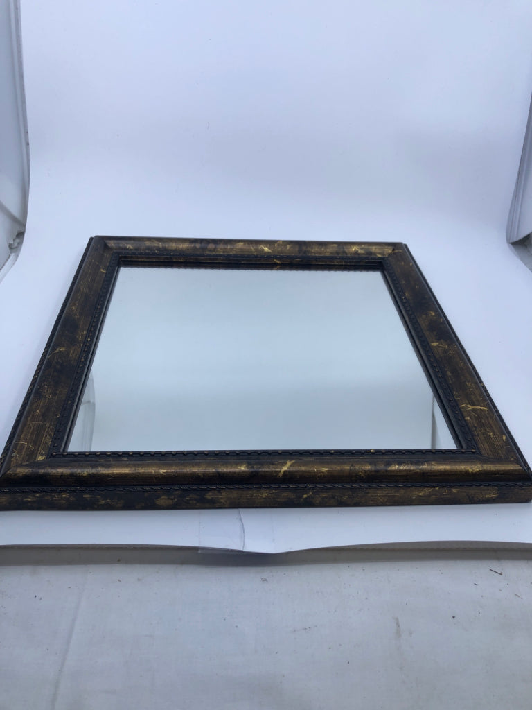 GOLD AND BLACK FRAME WALL MIRROR.