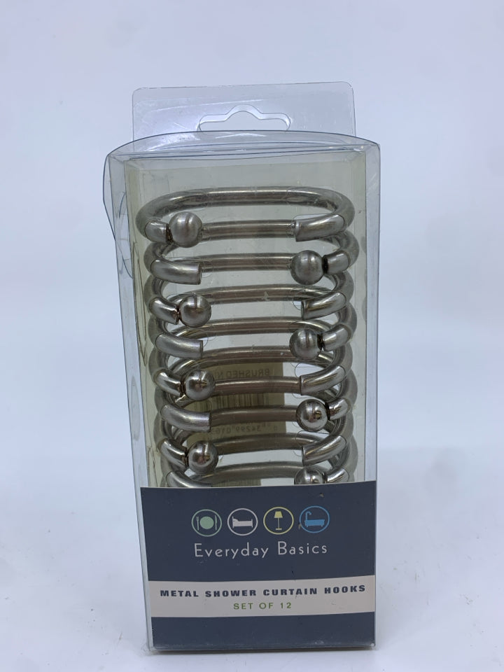 NIP BRUSHED NICKEL SHOWER CURTAIN HOOKS.